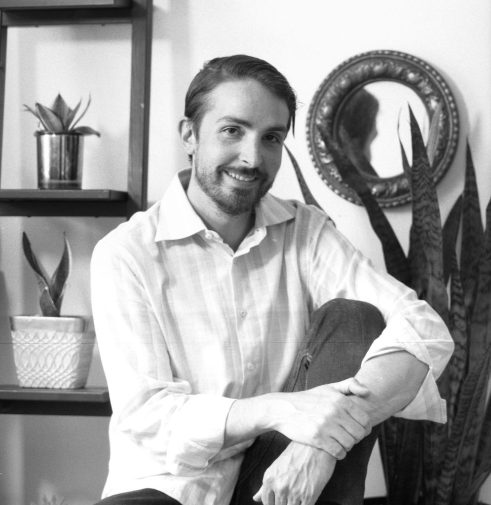 Monochrome portrait of man smiling